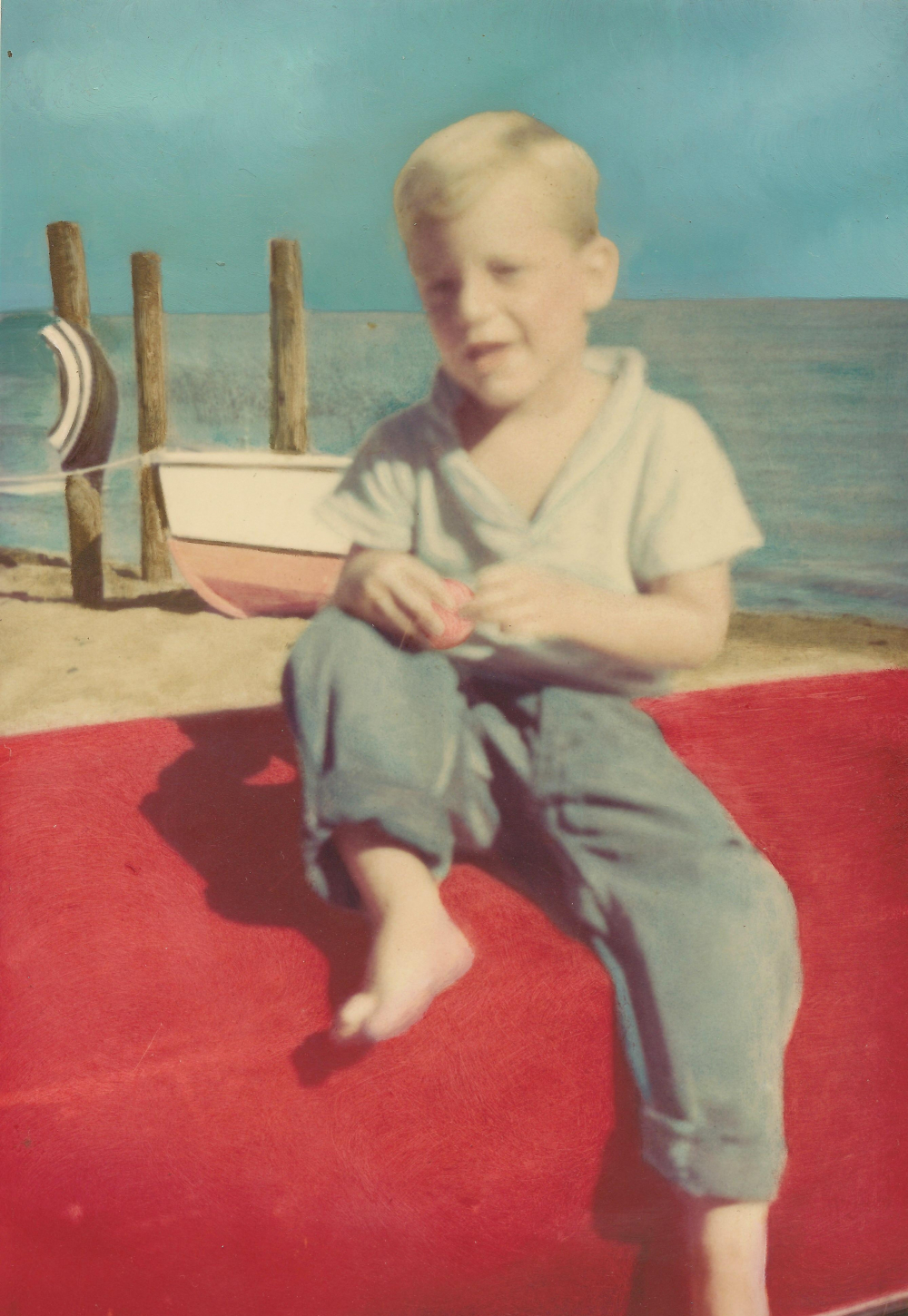 1962 - Mark Brazeau sit a top Paul Brazeau's 8 ft Pram hull (age 3)